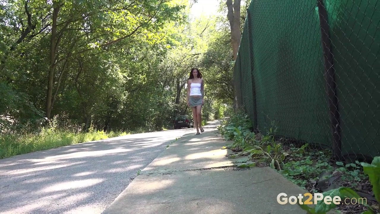 Ali B squats on a path and pees outside